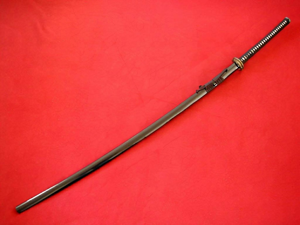 A sheathed Nodachi (aka Odachi). It is a large two-handed traditionally made Japanese sword (nihonto).