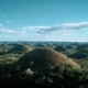 Waren antike Risen verantwortlech fir de Chocolate Hills op de Philippinen opzebauen? 19