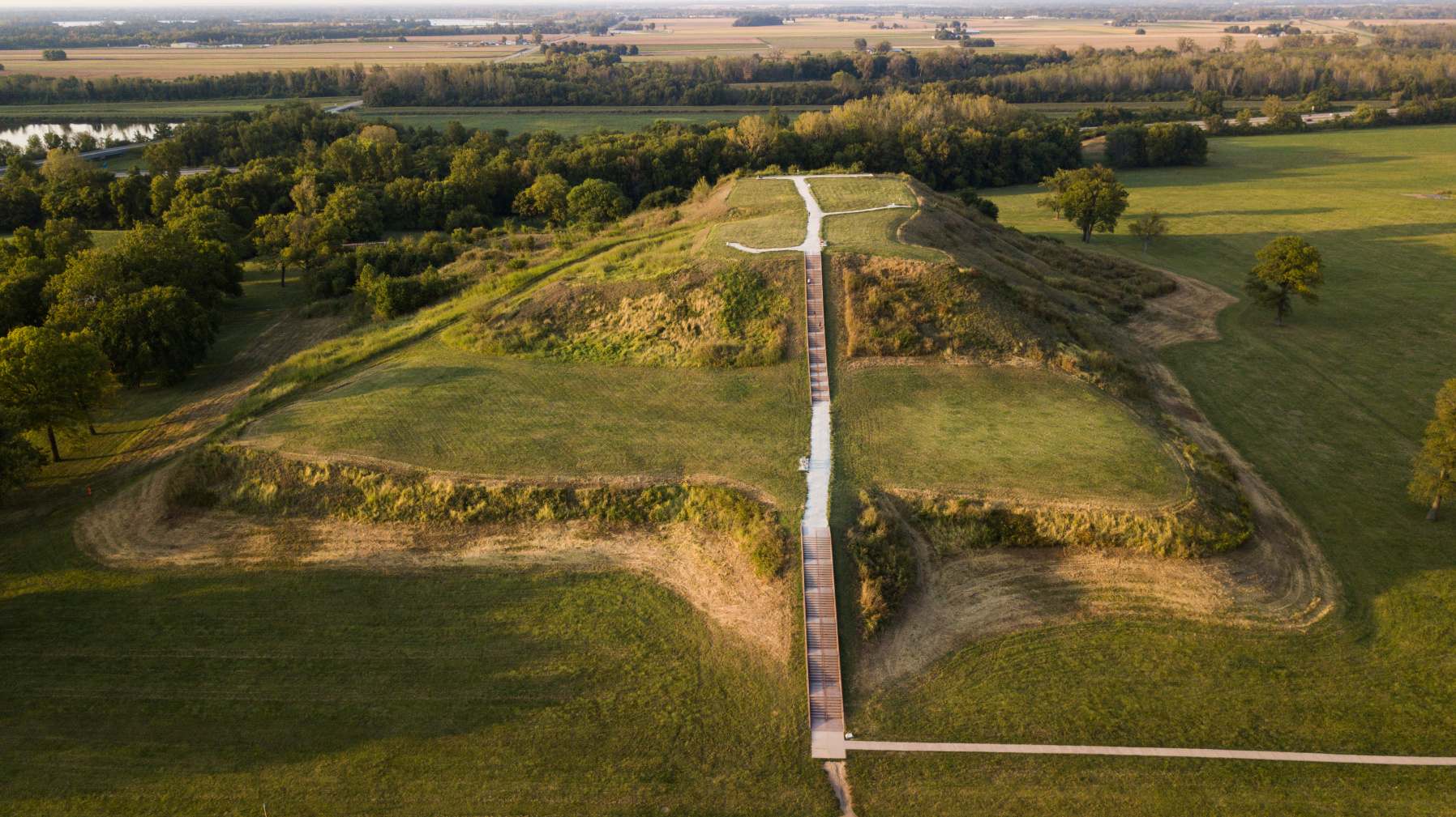 Monks Mound, built between 950 and 1100 CE and located at the Cahokia Mounds UNESCO World Heritage Site near Collinsville, Illinois, is the largest pre-Columbian earthwork in America north of Mesoamerica. A number of pre-Columbian cultures are collectively termed "Mound Builders".