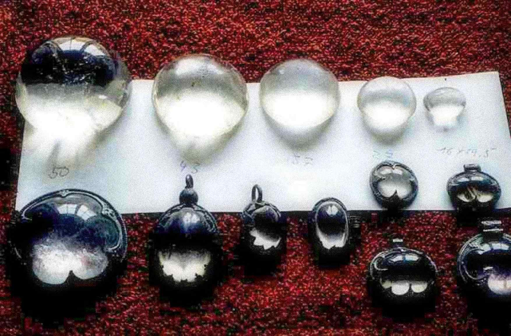 The lenses examined in Visby. Top row: unmounted lenses. Bottom row: mounted lenses, except the "ball". These lenses were initially thought to be ornaments.