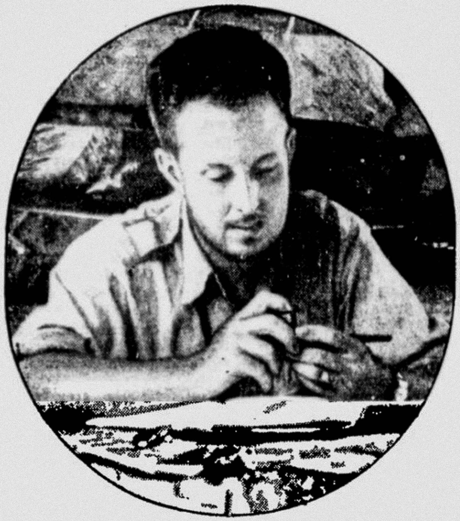 American explorer Theodore Morde seated at his desk in the Honduran rainforest while exploring la Mosquitia in 1940