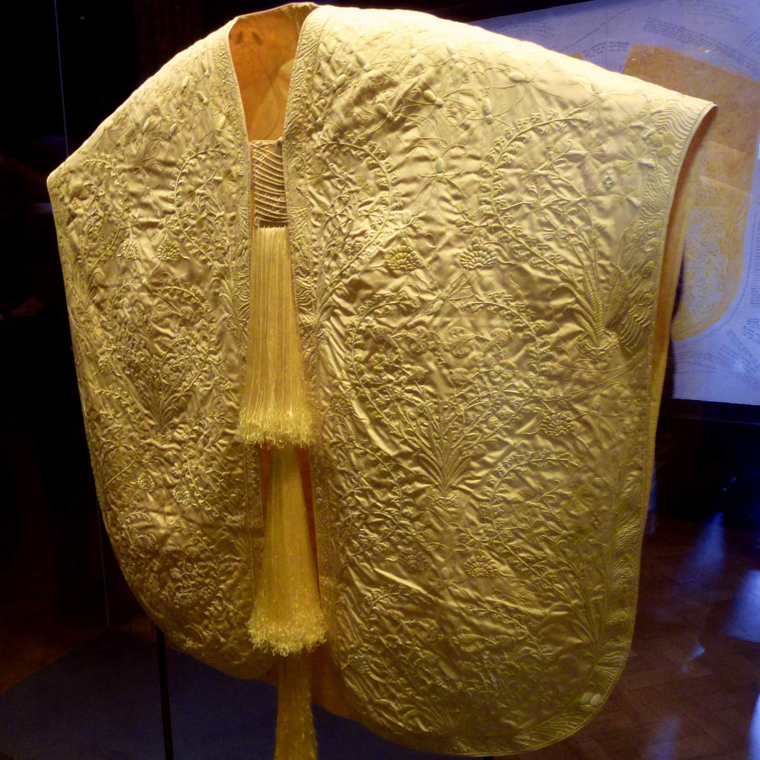 The golden cape, made from the silk of more than a million female Golden Orb Weaver spiders collected in the highlands of Madagascar exhibited at London's Victoria and Albert Museum in June 2012.