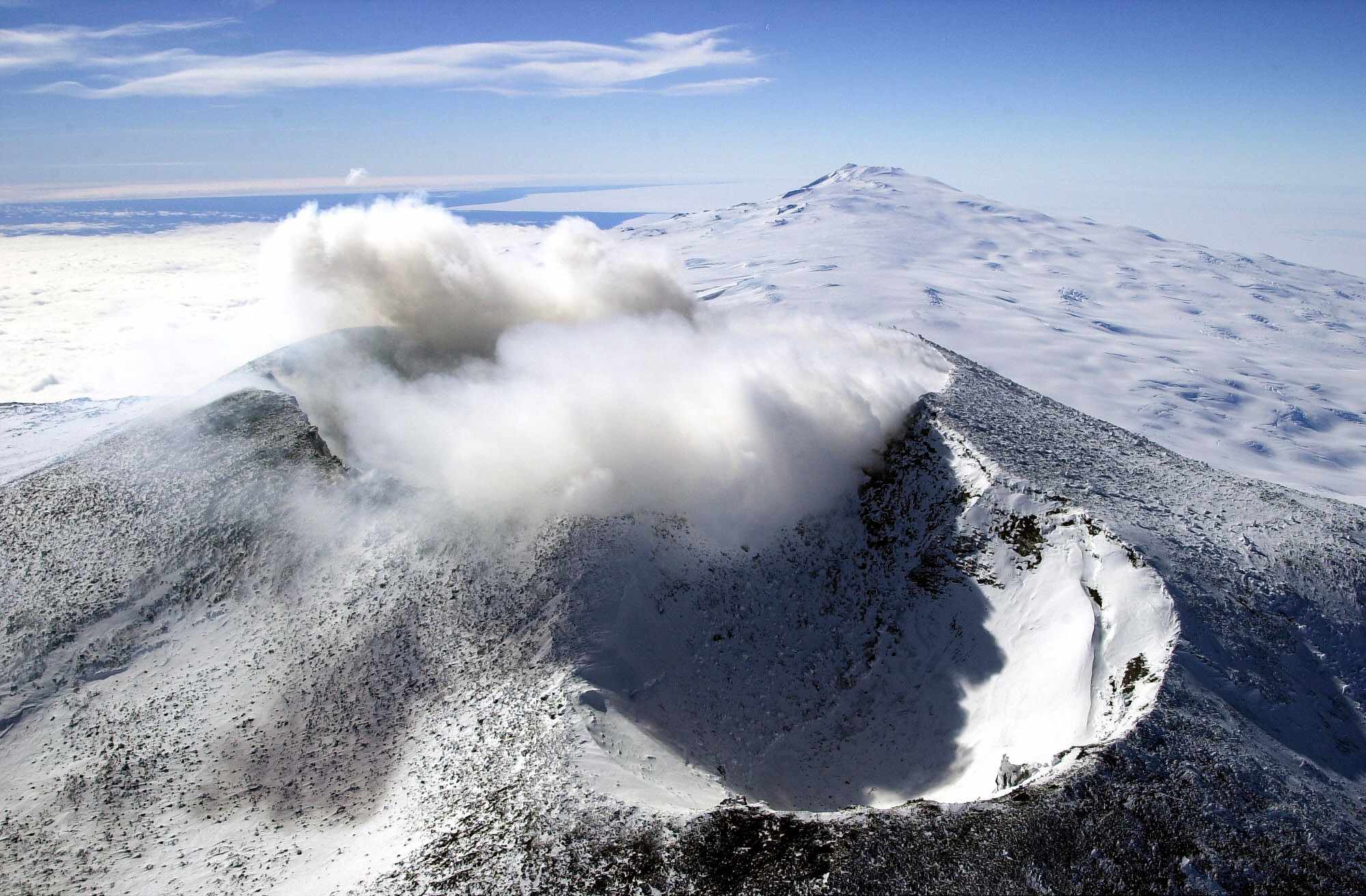 Aerial view of Mount Erebus craters in the foreground with Mount Terror in the background, Ross Island, Antarctica