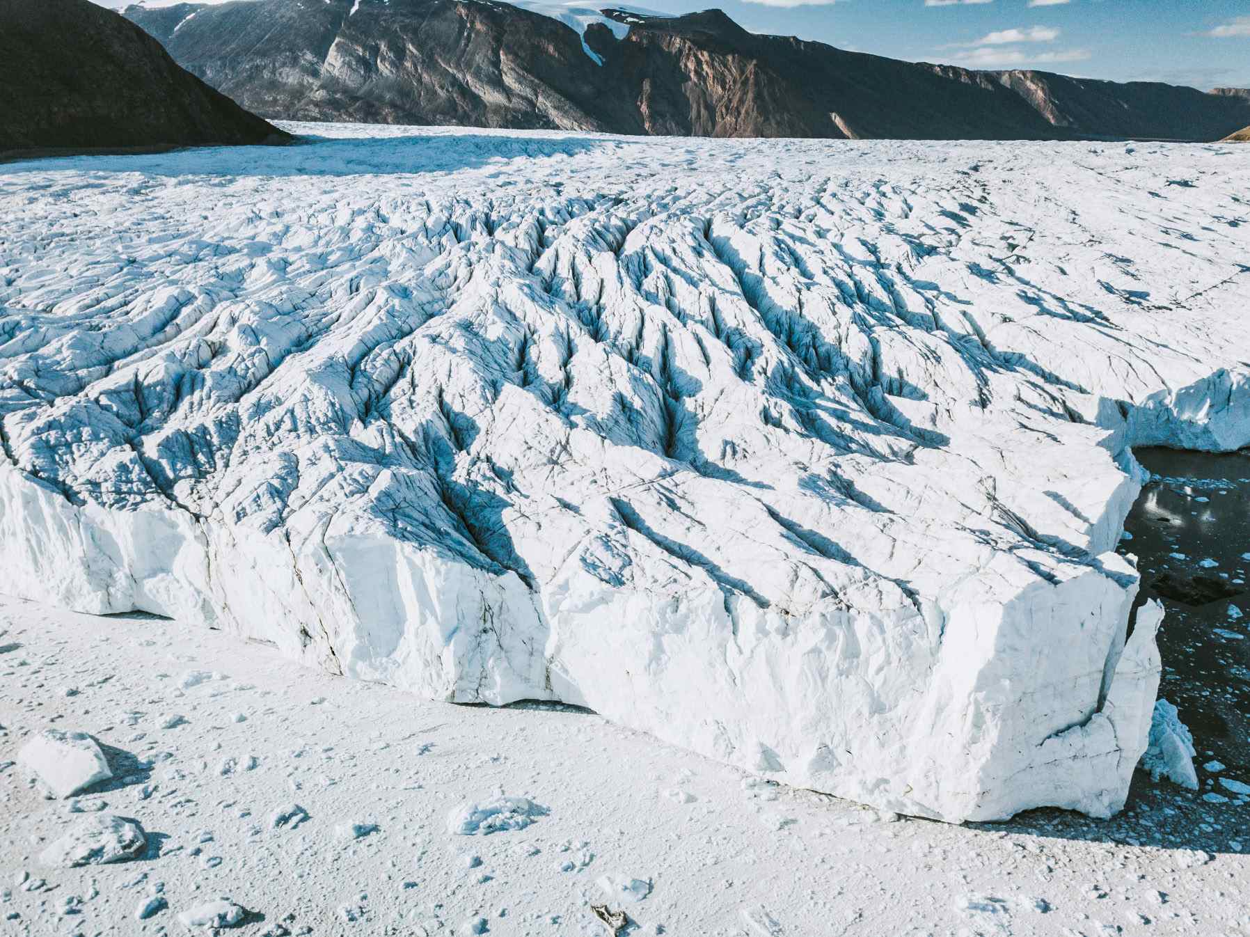 At the beginning of the last ice, local mountain glaciers grew and formed large ice sheets, like the one seen here in Greenland, that covered much of today's Canada, Siberia, and Northern Europe.
