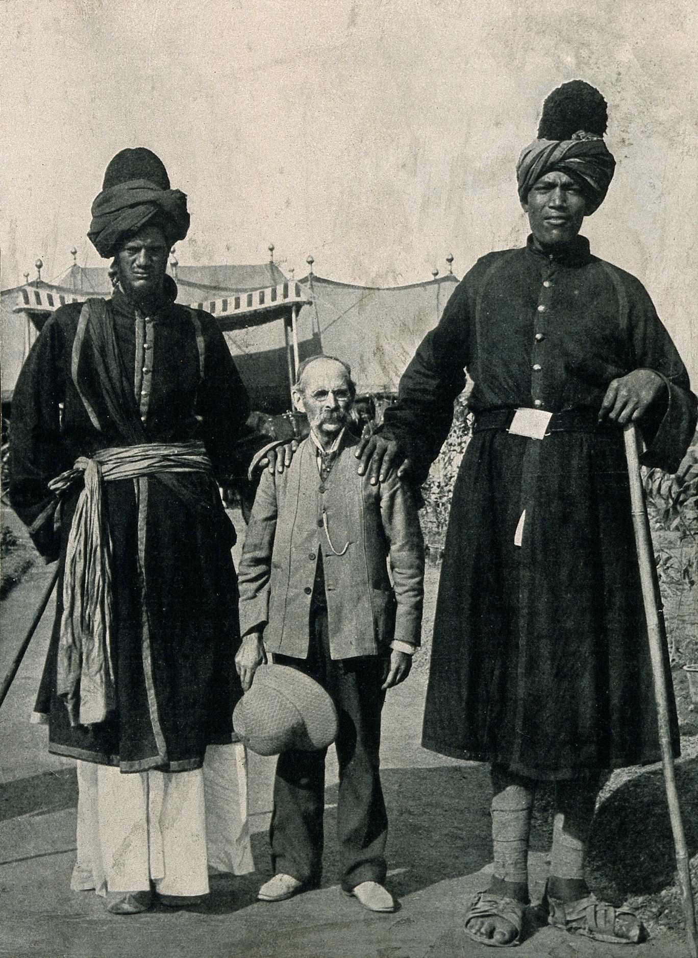 Two Kashmir giants, and their exhibitor, Professor Ricalton