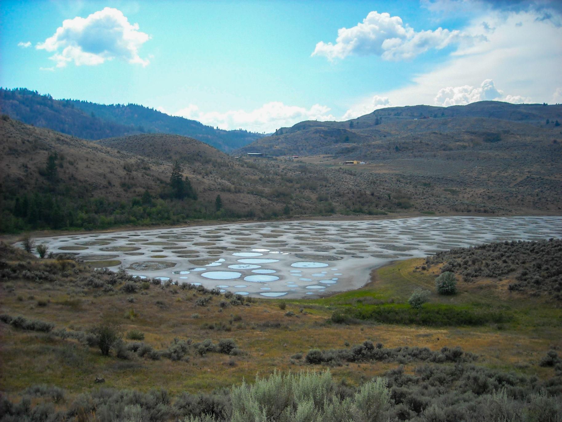 Spotted Lake from the shoulder of Highway 3. It is a saline endorheic alkali lake located northwest of Osoyoos in the eastern Similkameen Valley of British Columbia, Canada.